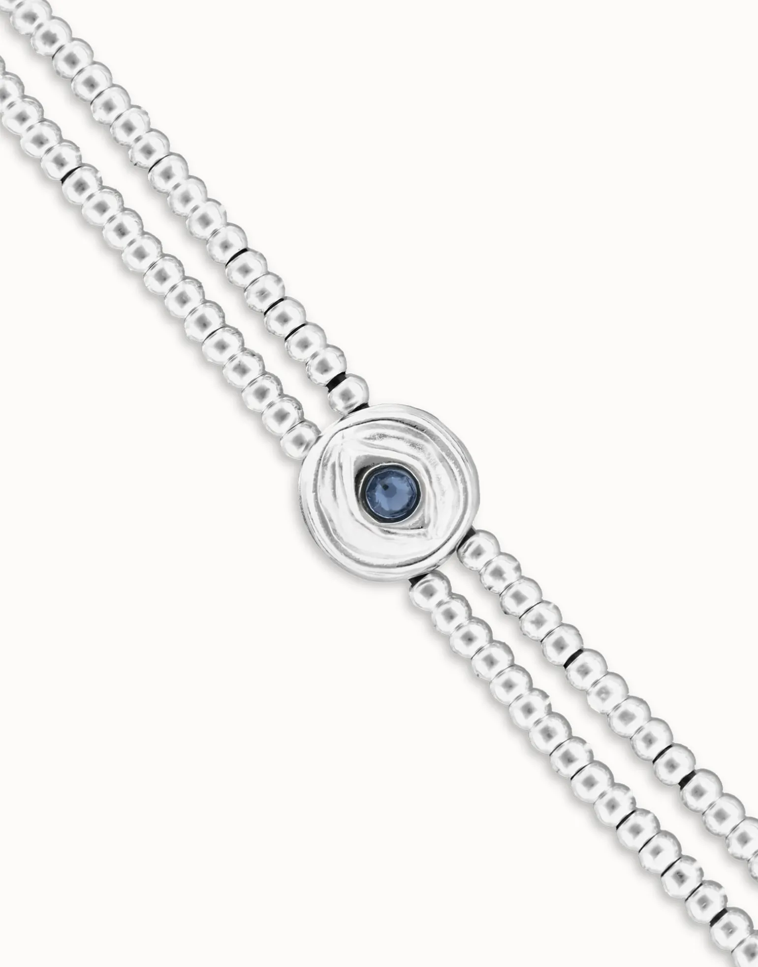 Two-strand beaded bracelet with an eye-shaped charm