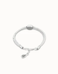 Two-strand beaded bracelet with an eye-shaped charm